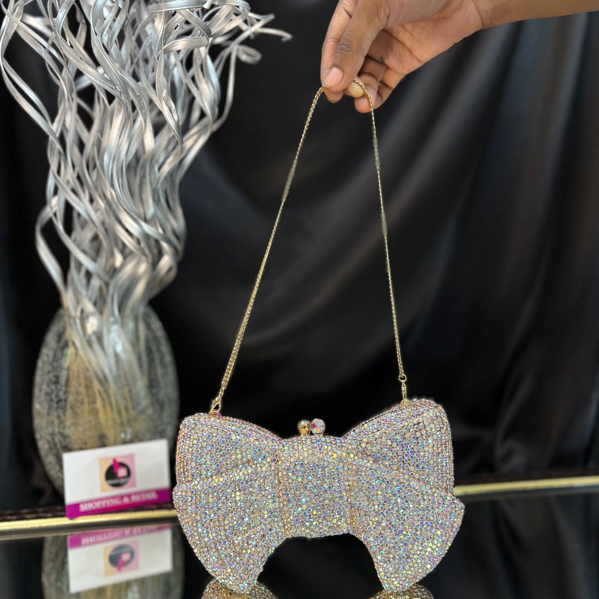 Charm Bow Crystal Clutch
